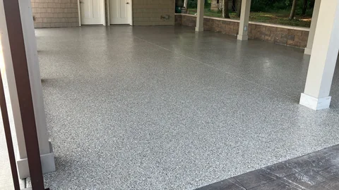 Coated floor beneath a covered patio