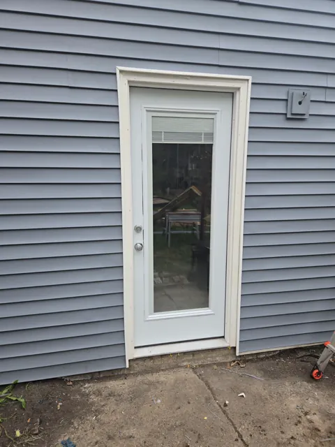 Exterior glass door with white trim