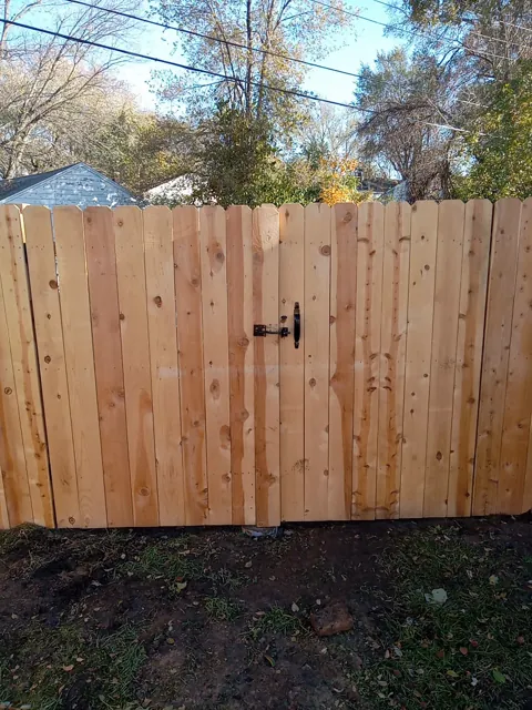 Wood double gate with dark hardware
