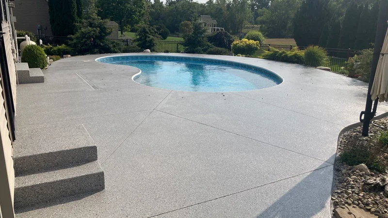 Gray pool surround with matching steps